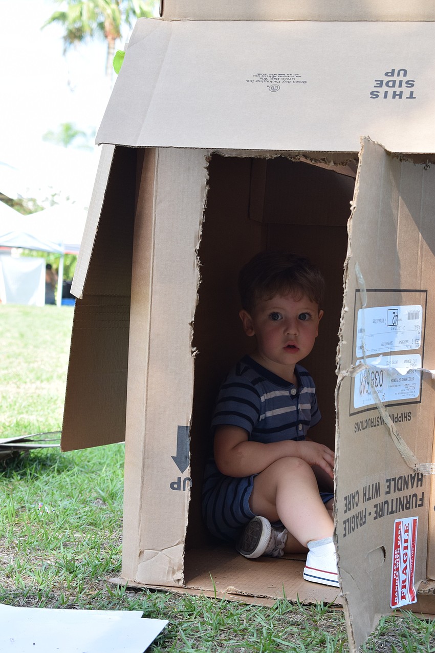University Park's Declan Cannon enjoyed the beginnings of a cardboard box fort.