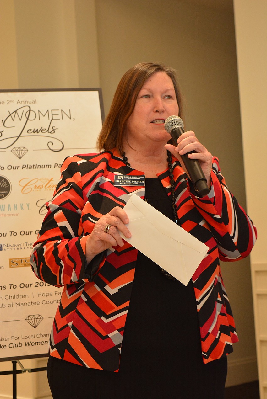 Boys & Girls Clubs of Manatee County Development Director Francine Diemer thanks Lake Club women for helping her organization throughout the year.