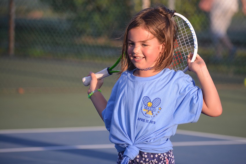 Kinley Gratton, 5, takes a breather during the action-packed event.