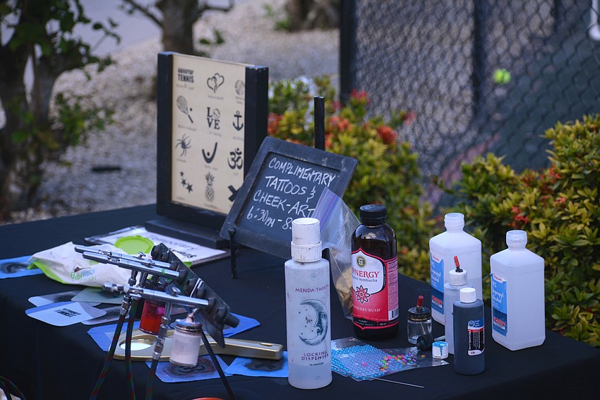 The event offered free temporary tattoos from Face Paint Sarasota (Pixie Painting) for guests and participants.
