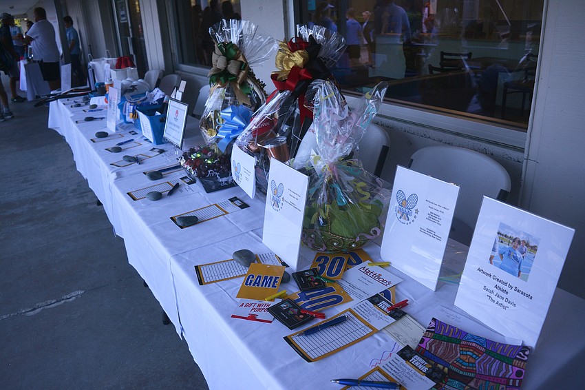 The event featured a silent auction, with items including a signed hat and shirt from top-10 player John Isner and private lessons from Nick Bollettieri.