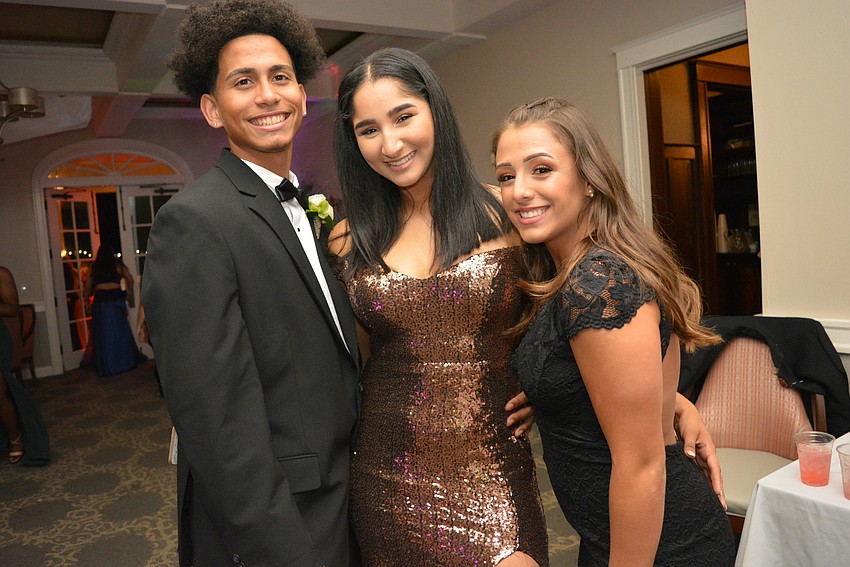 Juniors Francisco Hernandez, Fatima Demlak and Sofia Mejicanos say they love having a special night with their friends who are seniors.