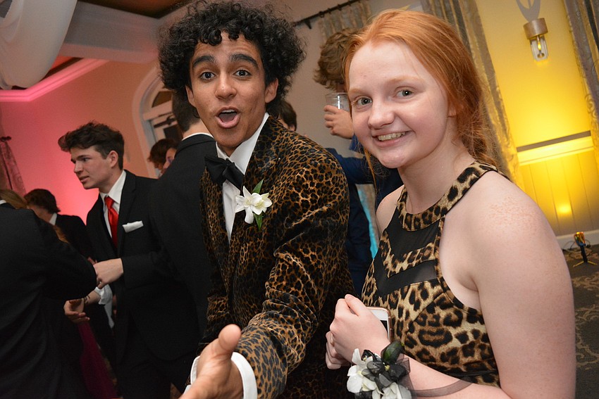 Senior Chris Ramos asked his date, sophomore Keara Henry, to wear leopard print to do 