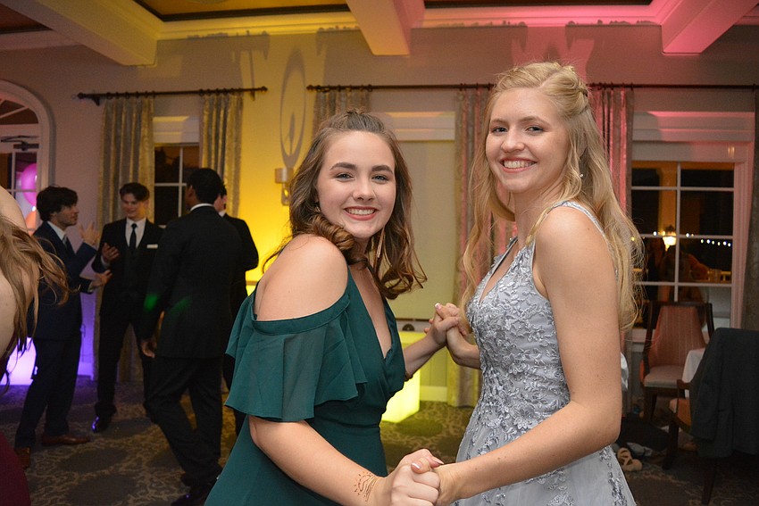 Alex Assha and Mia Hamill, both seniors, dance to 