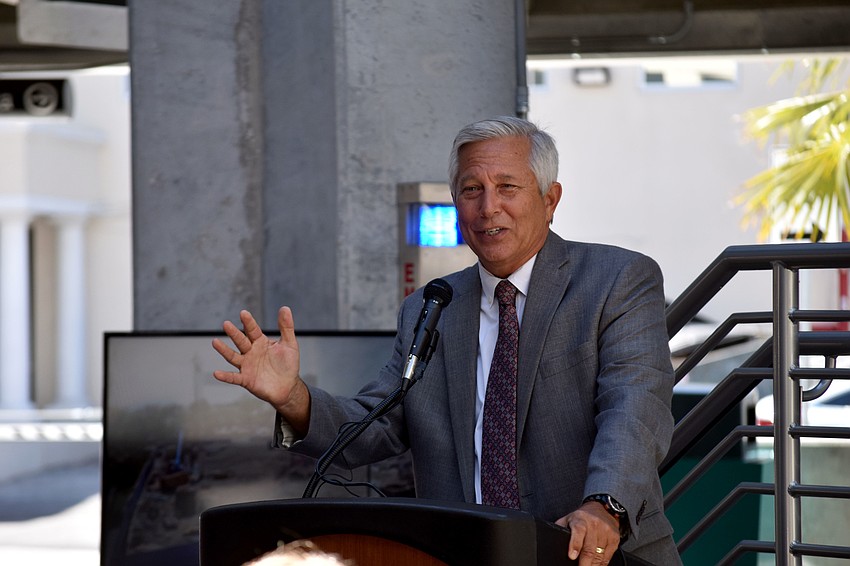 Sarasota Parking Manager Mark Lyons addresses the crowd.