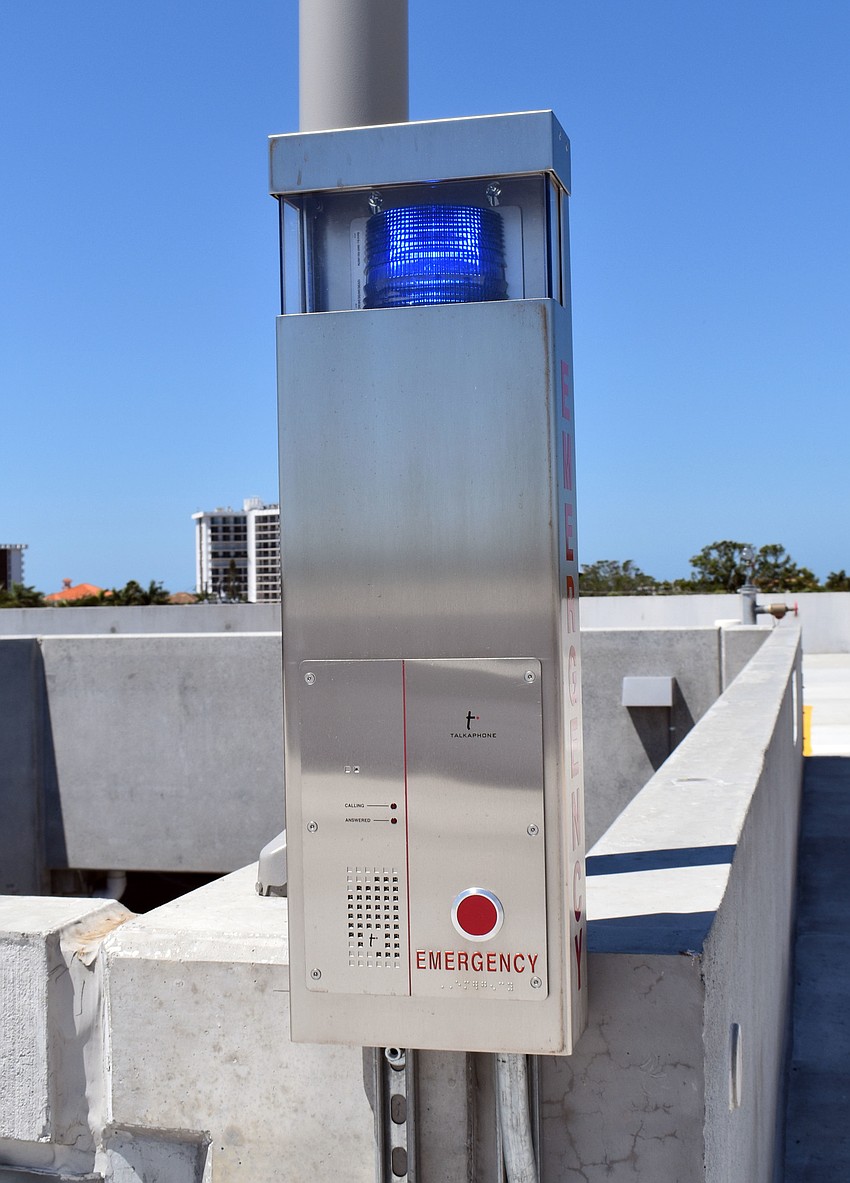 Various emergency boxes are located throughout the garage.