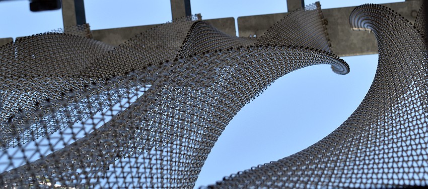 The outside of the garage features a metal facade.