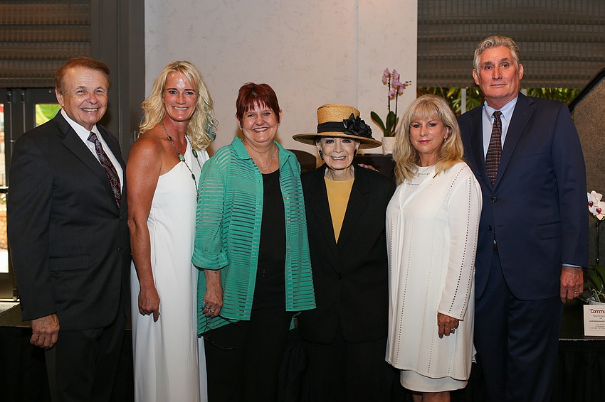 Honoree Larry Thompson, Chairwoman Chris Pfahler, Honoree Gayle Guynup, Founder and President Annette Scherman and honorees Julie Milton and Jon Thaxton