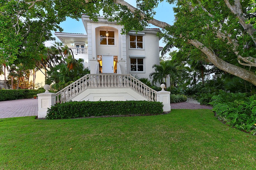 The front of the home overlooks the Longboat Key Club's Islandside golf course.