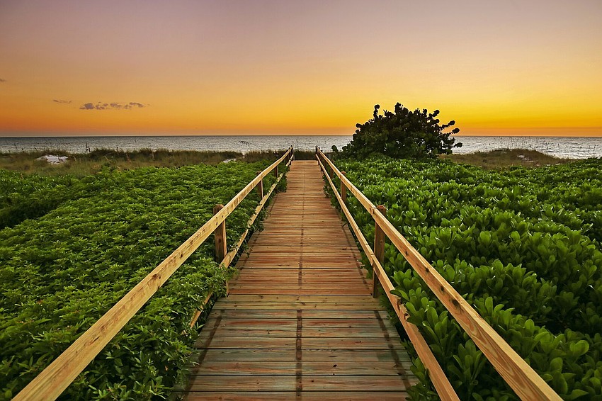 A private walk leads to the beach.