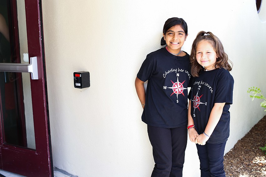 Daliah and Gaby greet guests as they walk into Sarasota Municipal Auditorium.