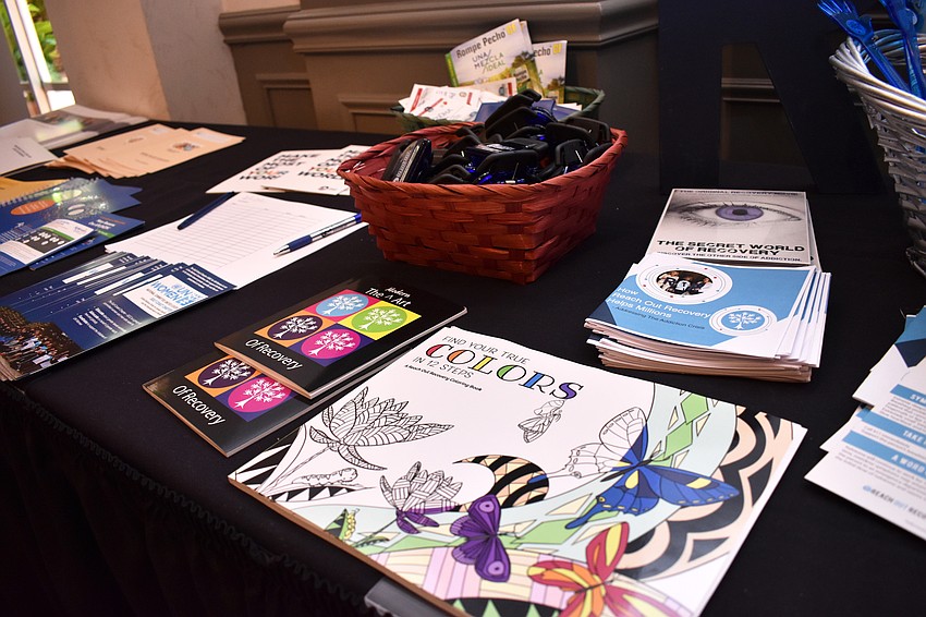 Reach Out Recovery provided educational materials such as a pamphlet explaining what to do in the case of an opioid overdose along with recovery materials like an adult coloring book.