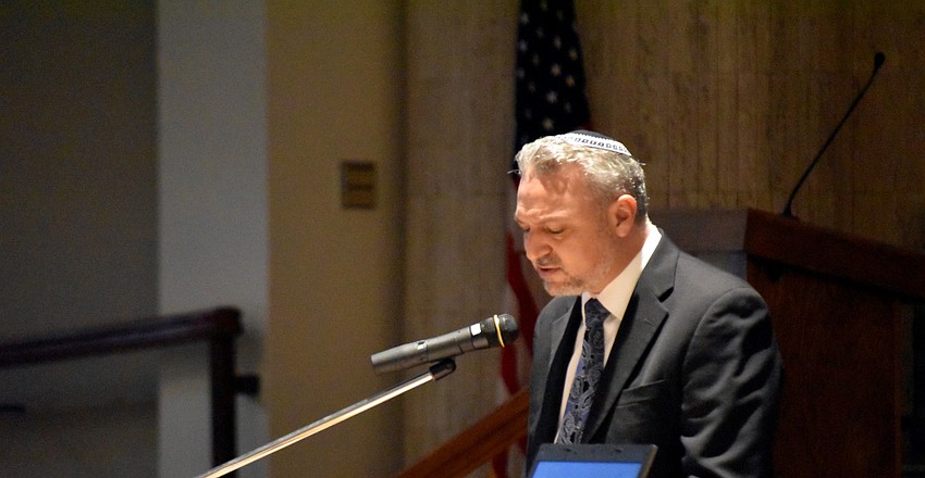 Rabbi Michael Shefrin leads the crowd through a call and response.