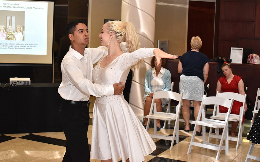 Sarah Haworth dances with a Dynasty Star dancer.