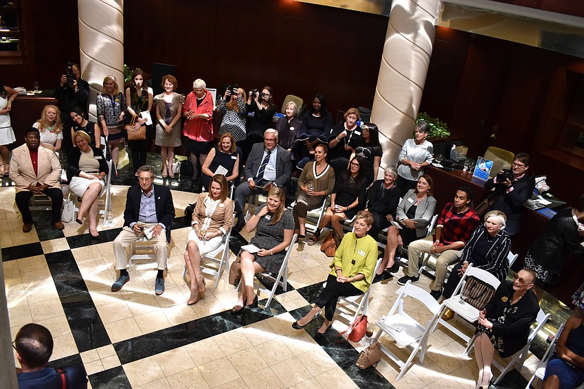 Attendees watch as Asolo Repertory Theatre is honored with a grant.