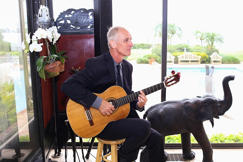 Dean Miller played music throughout the evening.