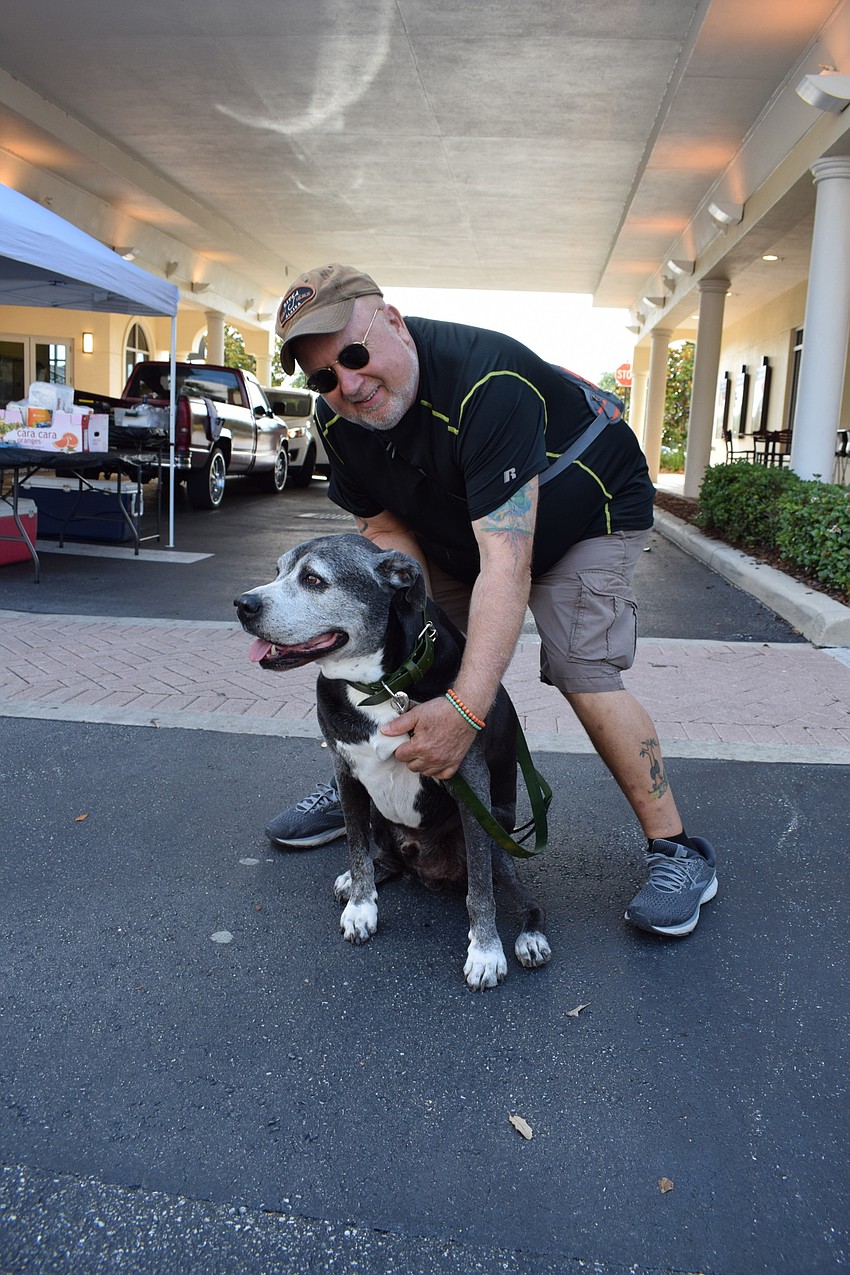 Summerville's Cliff Kaplan brought his dog, Travis, to enjoy Music on Main's festivities.