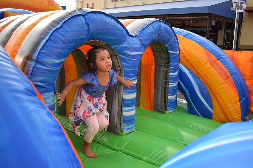 Sandee Yang, of West Bradenton, enjoyed the inflatable obstacle course.