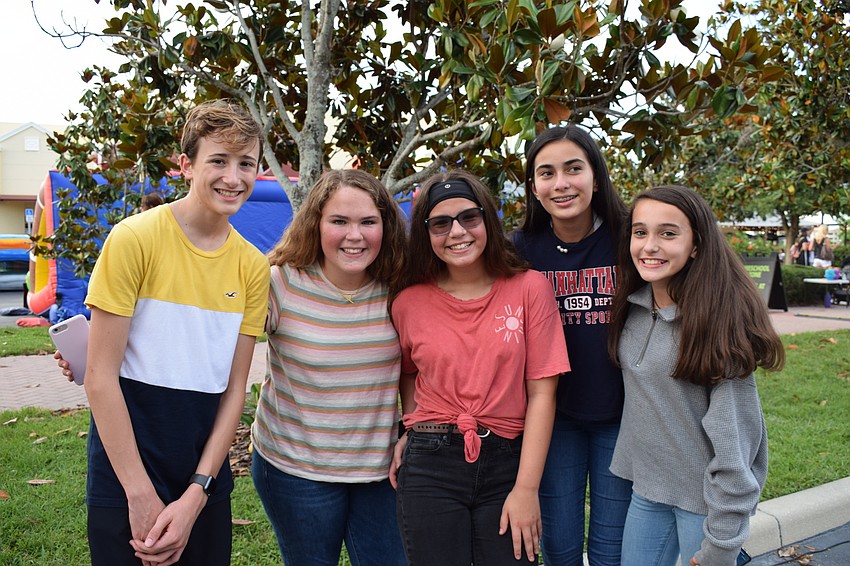 R. Dan Nolan Middle School students Stefan Richter, Abbie Becher, Sydney Oostendorp, Valentina Sanseverino and Katelyn Riley attend Music on Main together.