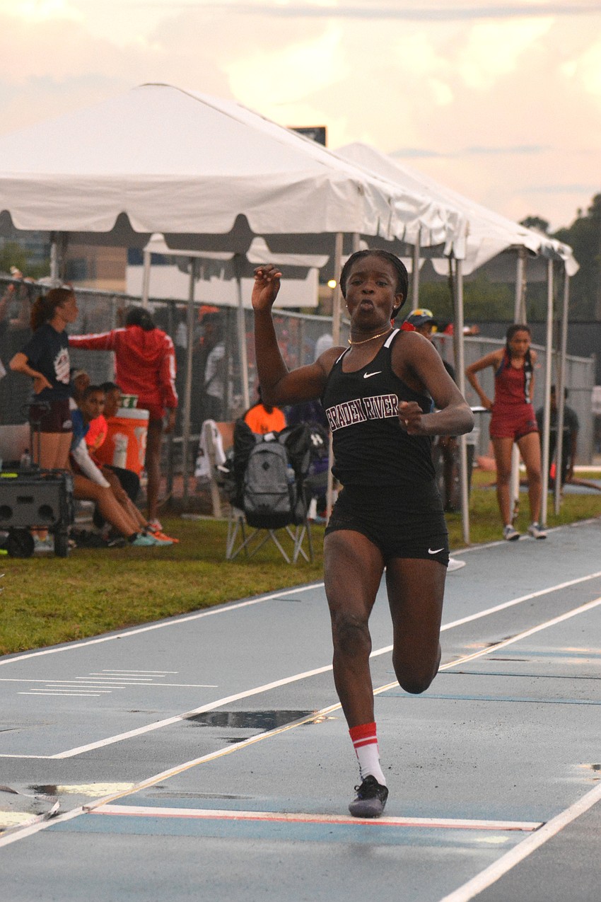 Braden River High junior Rose Ferla Philogene pounds the pavement in the 3A girls long jump.
