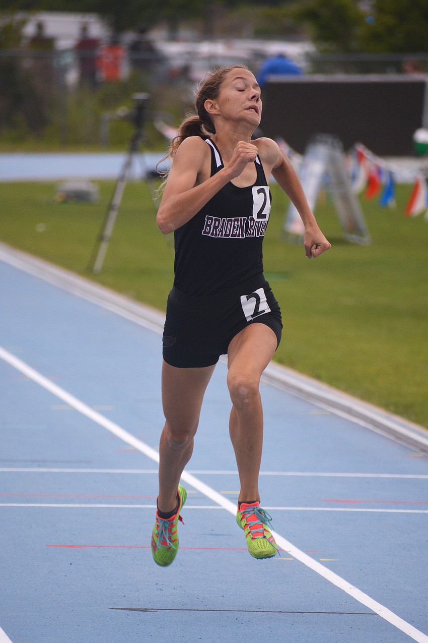 Braden River High freshman Hailey Marston gives her all in the 400-meter race. She finished 20th.