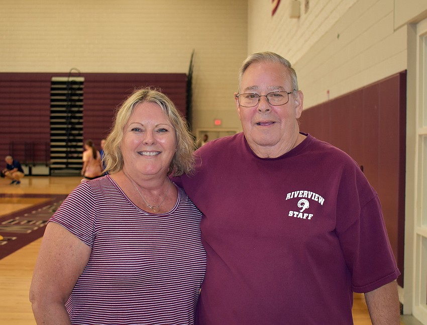Tammy Moore, math teacher and Riverview Fights Cancer sponsor;  and Tom Milner, a retired teacher and supporter of the club