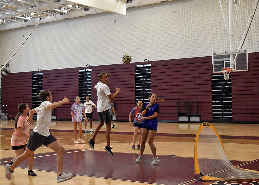 Jason Brzozowski heads the ball