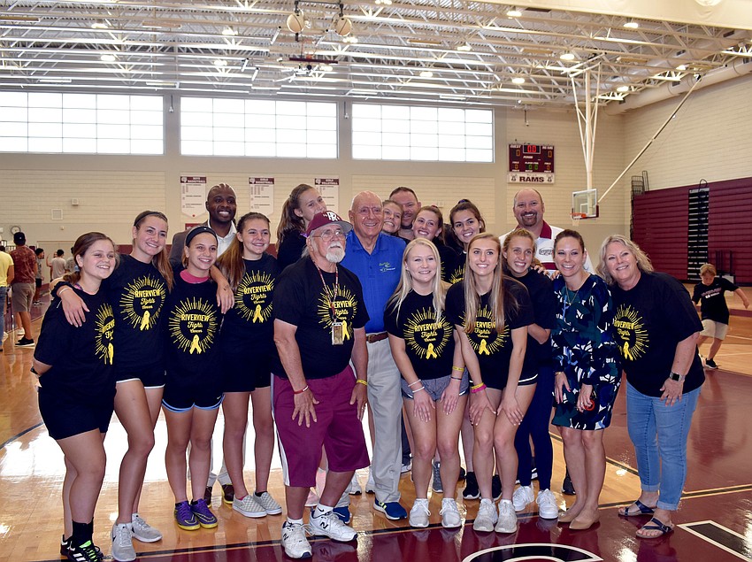 Riverview Fights Cancer members pose for a photo with Dick Vitale.