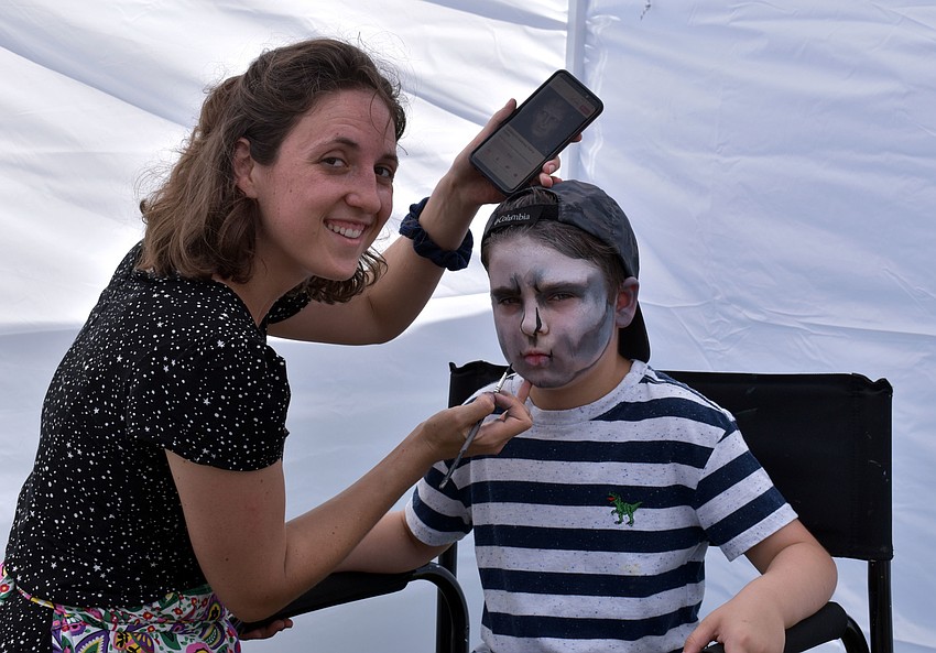Nadja Marks-Shafton paints Sam Hard, who requested to look like Voldemort.
