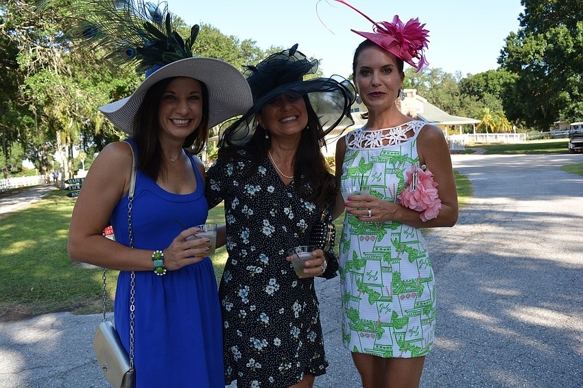 Sarasota's Sara Gapin, Lakewood Ranch's Denise Drizos and Lakewood Ranch's Shari Phillips enjoy mint juleps.