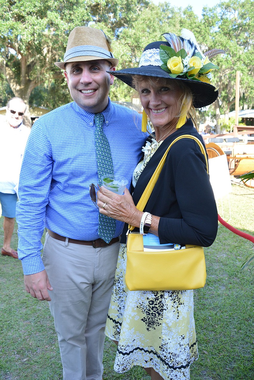 Circus Arts Conservatory representatives Michael Salmon and Marcia Carlson Pack looked the part. Carlson Pack decorated both their hats herself.