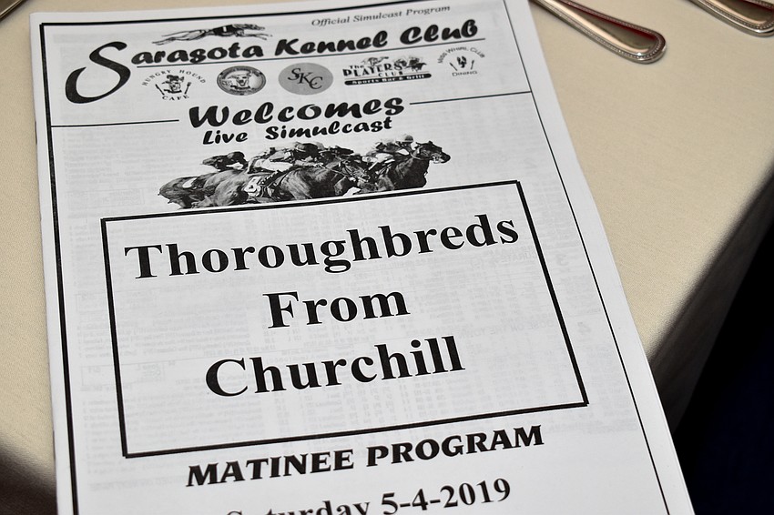 Club members gathered for a cocktail hour before the race began.