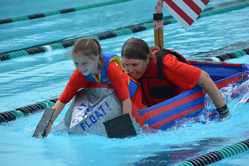 Palmetto's Maylee Teeple and Lynn Meier give it their all in the final heat.