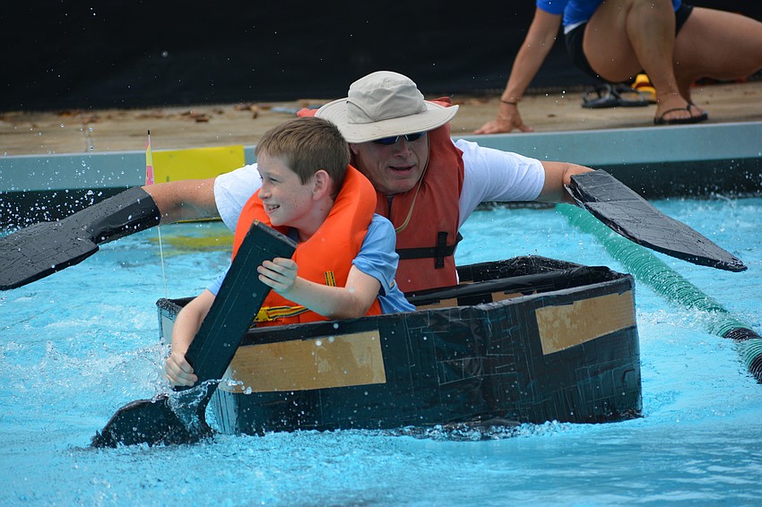 Gullett student Oakley Kehres and his dad, Craig Kehres, blaze to the overall victory in 21.03 seconds.