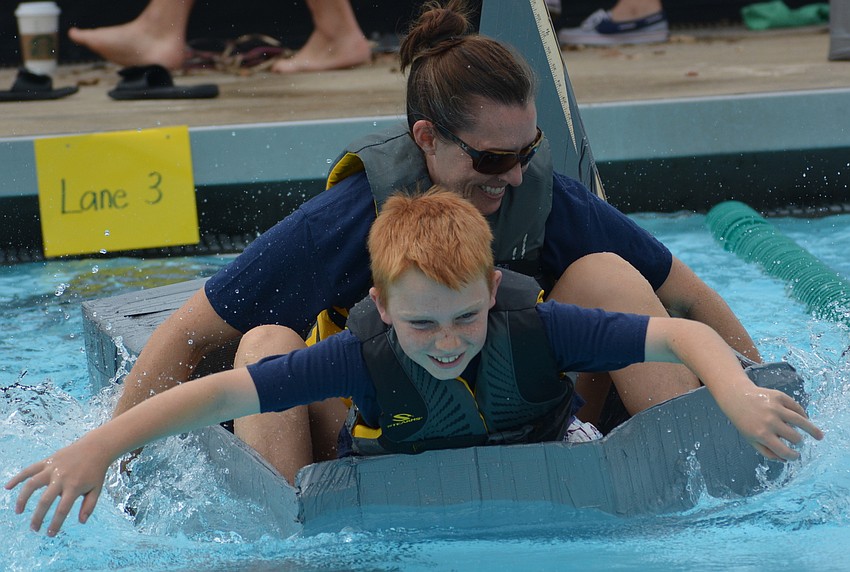 Tara student Caden Campbell works in concert with his mom, Tara Principal Laura Campbell.