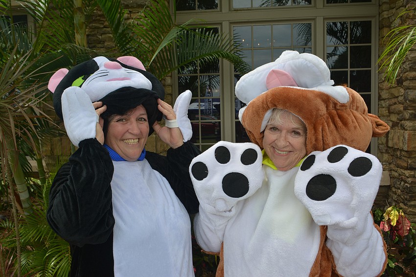Kathy Leuthauser, the Humane Society at Lakewood Ranch's volunteer coordinator, and Humane Society Treasurer Christine Legge, had the tough task of being inside the mascot costumes on a hot day.