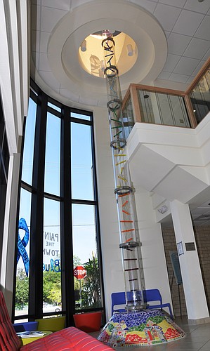 The Pillar of Hope stands in the lobby of CPCâ€™s Child Advocacy Center. After a childâ€™s initial services, the child and a staff member drop a blue marble down the pillar to join other marbles, symbolizing they are not alone.