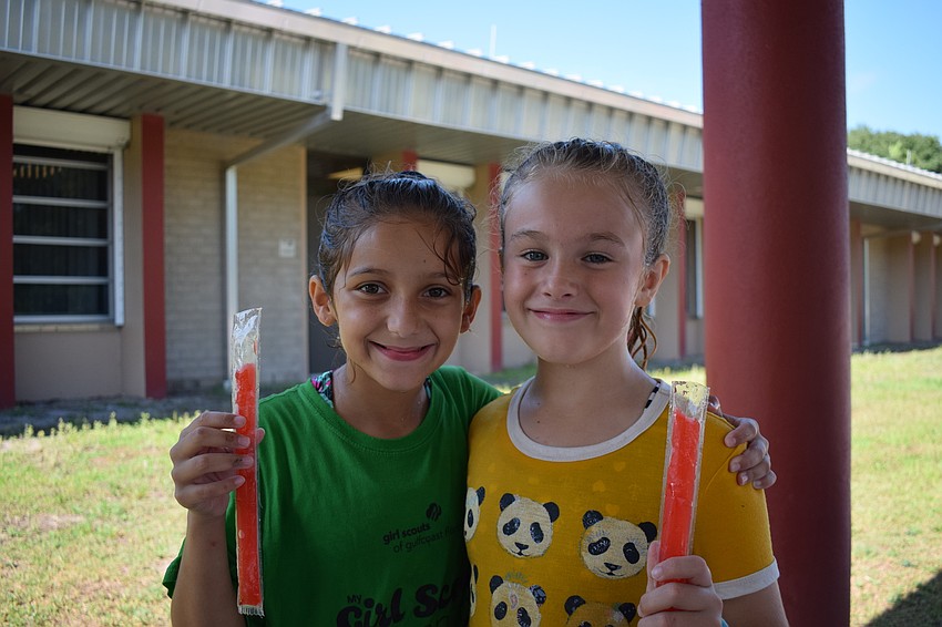 Talia Giagrante and Elizabeth Fross spent a few minutes drying off and cooling down.