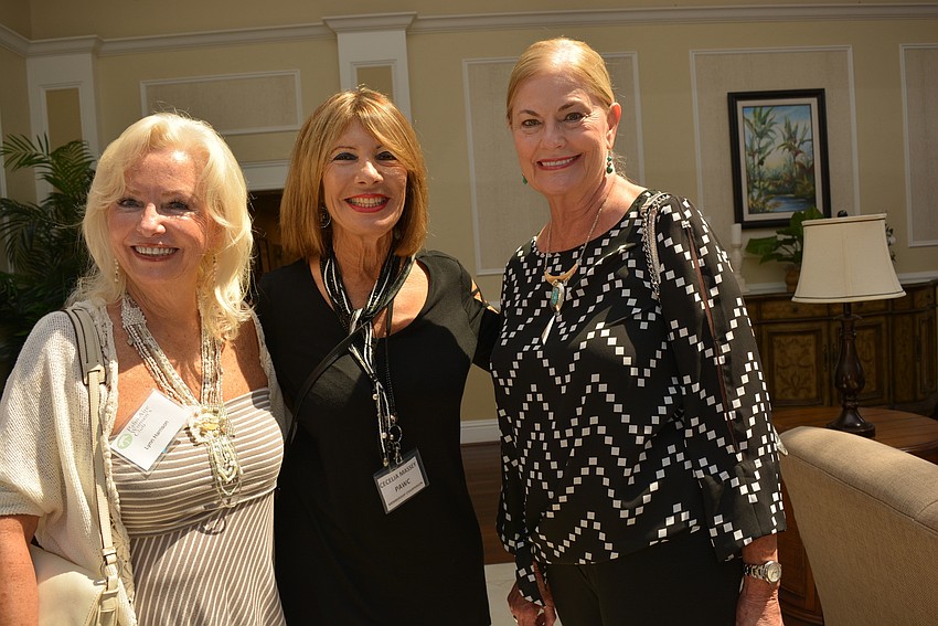 Lynn Harrison, Cecelia Massey and Candice Holloway were eager to chat with new and old members alike.