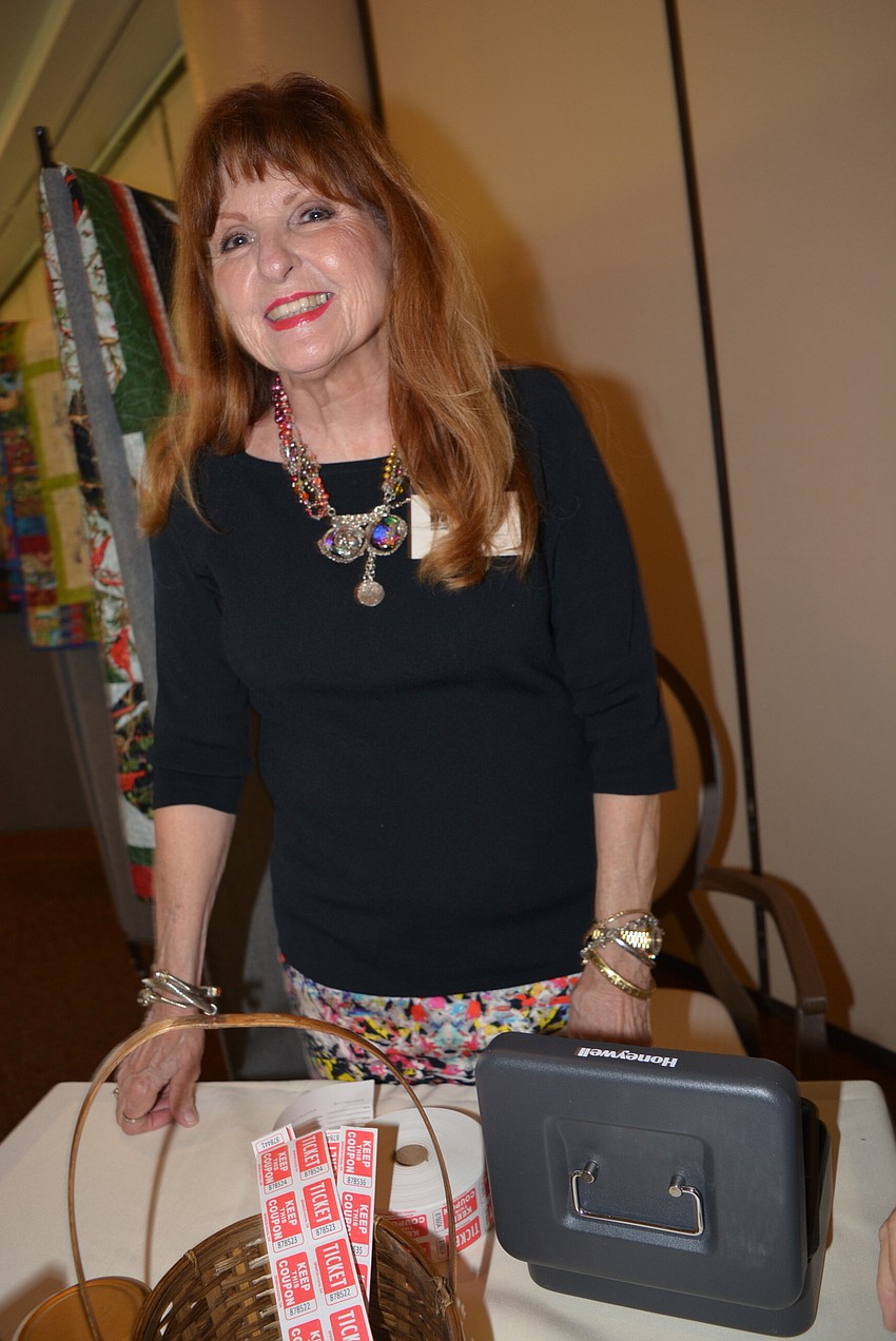 Sammy Ulbrick collected money for the 50/50 raffle.