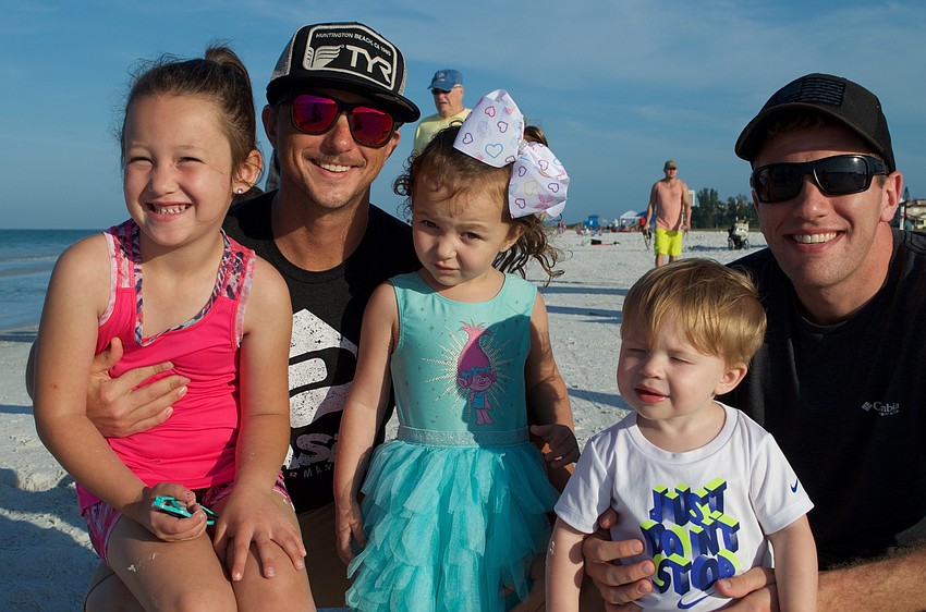 Braelynn McGrain and Gracie McGrain were at the beach with dad, Wyatt along with CJ and Collin Smith. They were cheering on family members in the race.