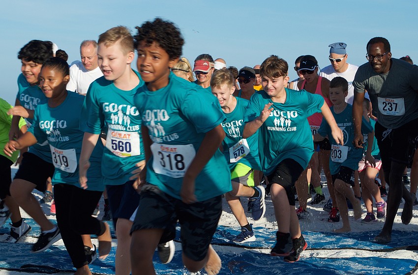 Runners took off from the starting line at 8 a.m.