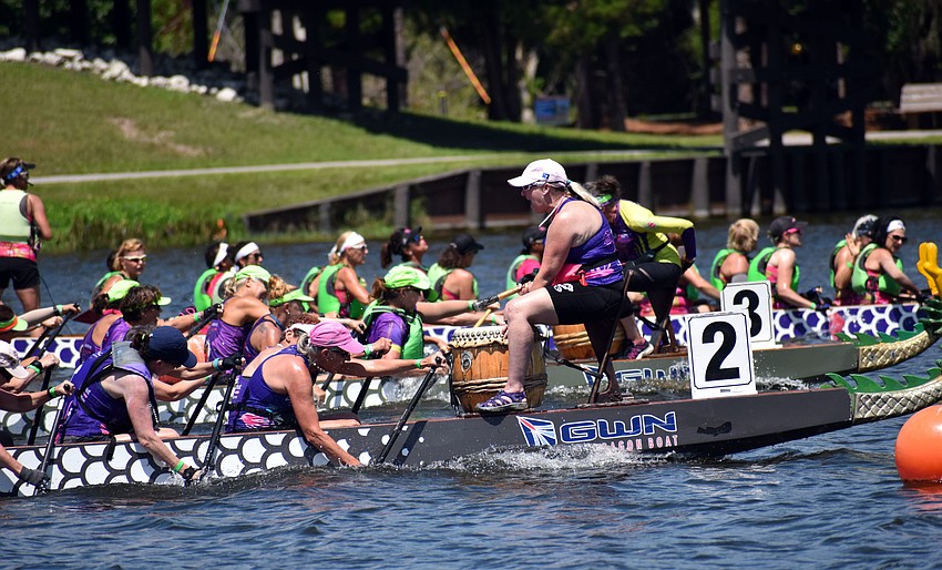 Survivors in Sync comfortably won this 500-meter race, but the remaining boats were neck and neck.