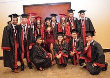 English as a second language students gather for a picture together before separating into their academies.