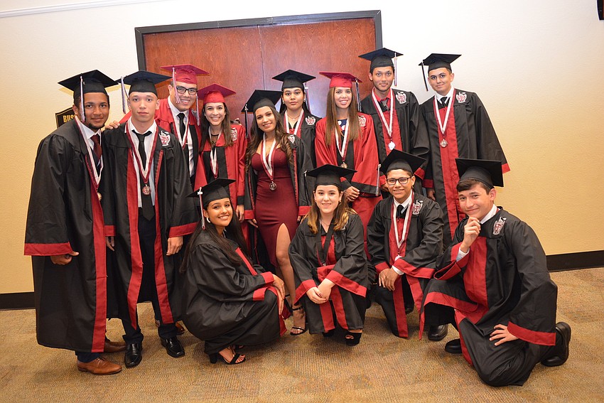 English as a second language students gather for a picture together before separating into their academies.