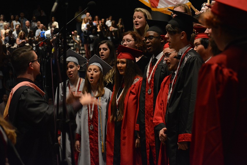 River Rhapsody performs the national anthem.