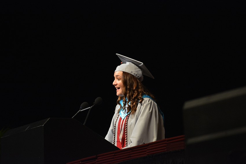 Senior commencement speaker Alana Kelly tells fellow graduates to be confident and have conviction. 