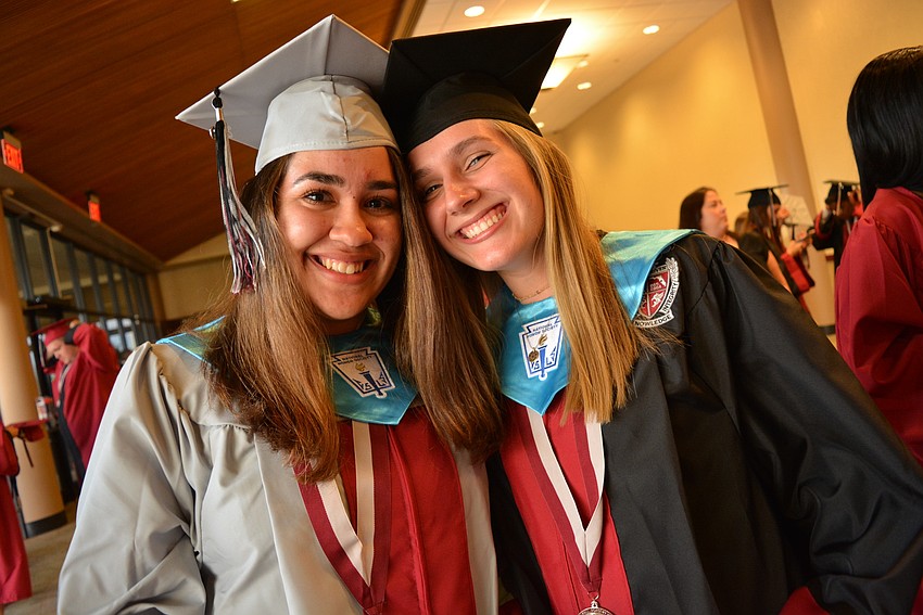 Amanda Hernandez and Sarah Farmer have known each other since eighth grade. They are excited and sad. 