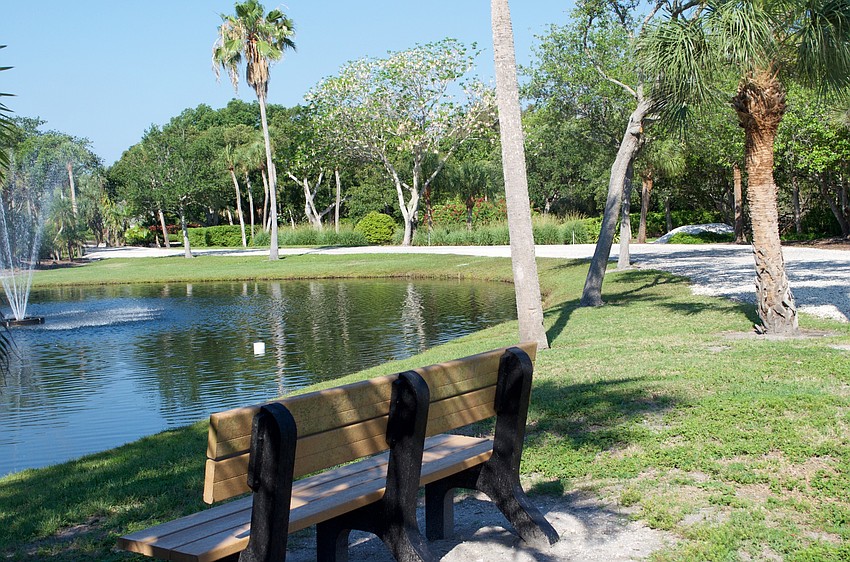 A pond and fountain greet visitors.