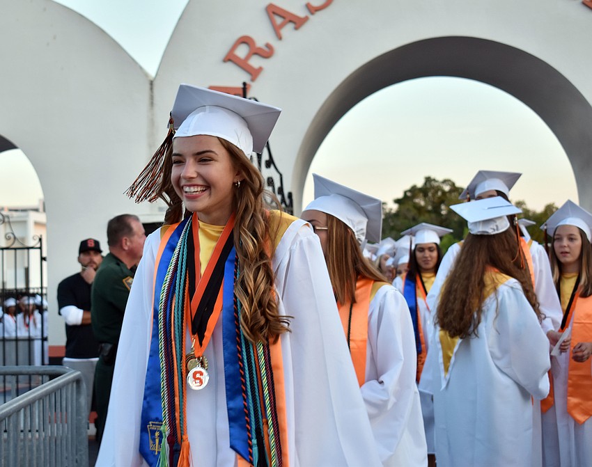Taylor Sawyer, one of the evening's speakers, was all smiles as she entered the stadium.